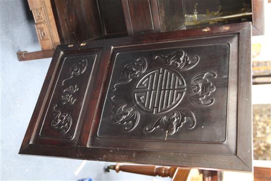 An early 20th century Chinese hongmu cabinet, W.3ft 9in. D.1ft 7in. H.3ft 11in.